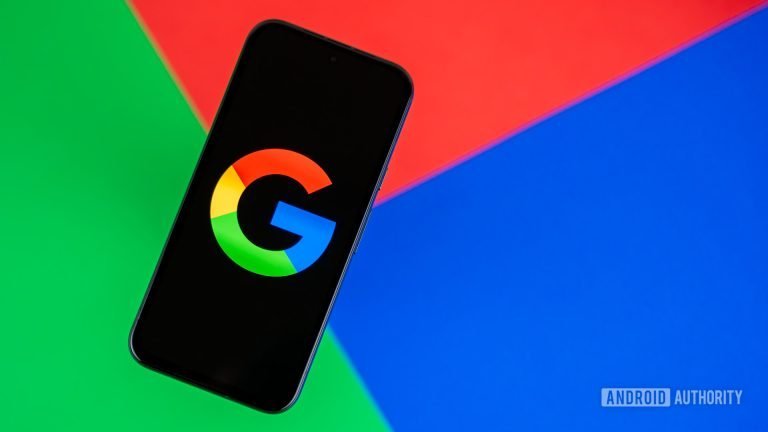 Google or Google Search logo on smartphone, with colorful background stock photo (2)